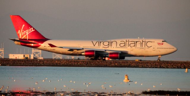 Boeing 747-200 (G-VBIG) - Taxiing to 28L for Takeoff.  Operating as VIR # 20 to LHR  01-31-2013