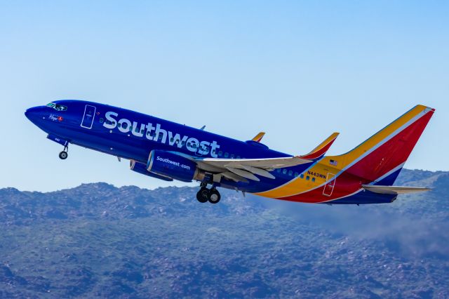 Boeing 737-700 (N443WN) - A Southwest 737-700 taking off from PHX on 2/10/23 during the Super Bowl rush. Taken with a Canon R7 and Canon EF 100-400 II L lens.