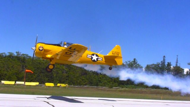 — — - Departing Mackinac Island Airport.