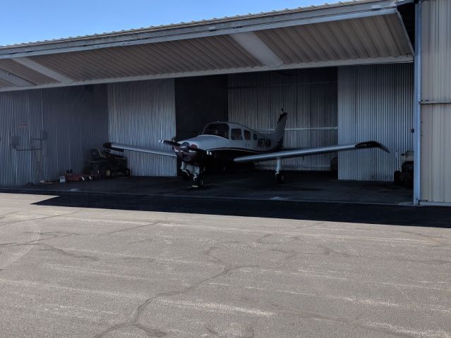 Beechcraft Sundowner (N8741M) - Musketeer in the hangar