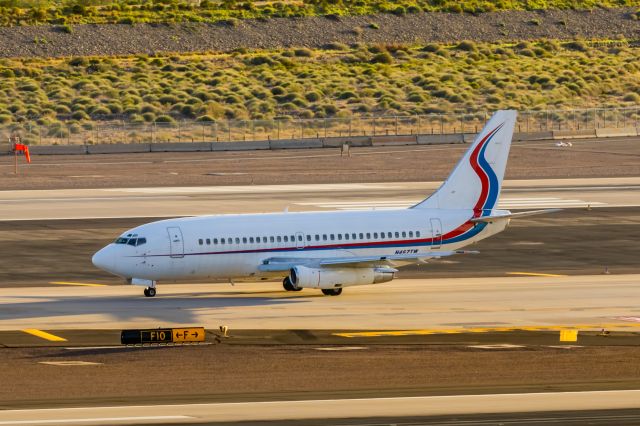 Boeing 737-200 (N467TW) - An Ameristar 737-200 taxiing at PHX on 2/19/23. Taken with a Canon T7 and Tamron 70-200 G2 lens.