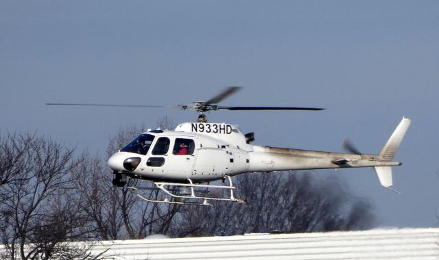 Eurocopter AS-350 AStar (N933HD) - Shortly after departure is this 2013 Eurocopter AS-350 in the Winter of 2018. This turbo-prop is used by the local CBS television affiliate. Now where is the closest Helo Wash?