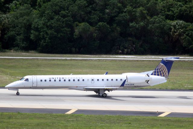 Embraer ERJ-135 (N14204) - United Flight 4318 operated by Express Jet (N14204) arrives at Tampa International Airport following a flight from Cleveland-Hopkins International Airport