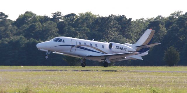 Cessna Citation Excel/XLS (N846JS) - A Cessna Citation takes off from Monmouth Jet Center, NJ