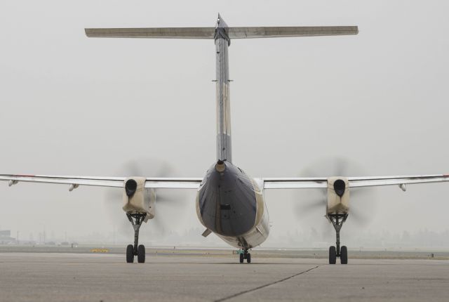 de Havilland Dash 8-100 (N435QX) - SMOKE IN GEG, 245 POLLUTION