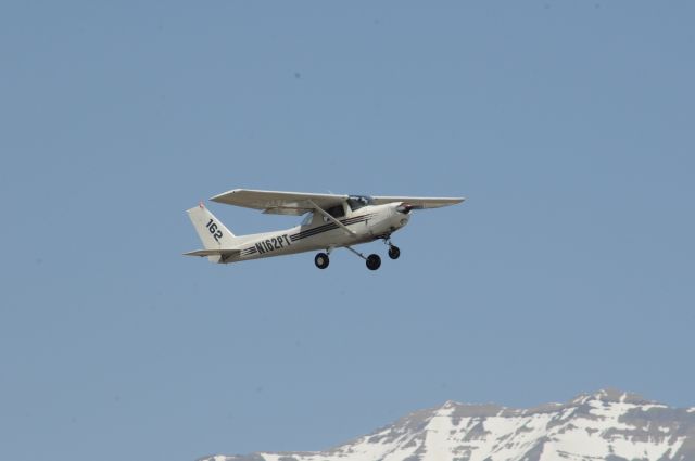 Cessna 152 (N162PT) - A very picturesque background with the Wasatch mountains. A Cessna from South Valley Regional (U42) doing touch n go’s. Best viewed in full! 