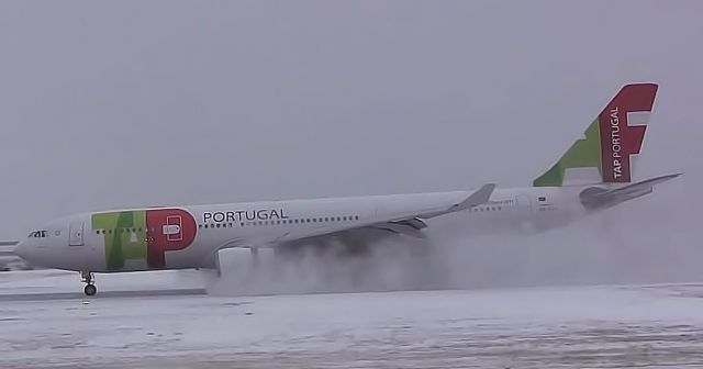 Airbus A330-200 (CS-TOP) - This aircraft makes a medical diversion during a snowstorm at Gander International.