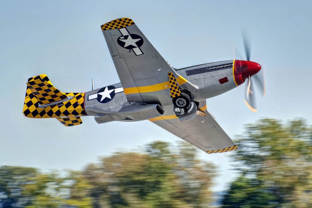 North American P-51 Mustang (N51MV) - P-51 "Luscious Lisa"; banks and climbs after taking off.