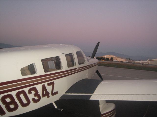 Piper Saratoga (N8034Z) - N8034Z on the Eight Ball Ramp - Van Nuys, CA at sunset.