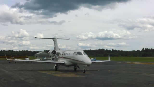 Embraer Phenom 300 (N344QS) - NetJets Embraer Phenom 300 on the ramp at KORE.