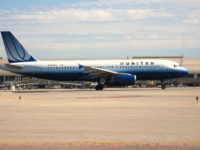 Airbus A320 (N498UA) - Holding on RWY 19R