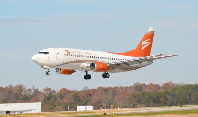 BOEING 737-300 (N531AU) - Swift Air charter in from Nassau for the Basketball team.br /23L Arrival.