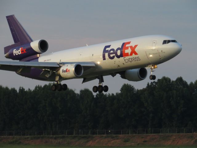 McDonnell Douglas DC-10 (N560FE) - Taken from airport overlook July 17, 2014. Arriving on 18c