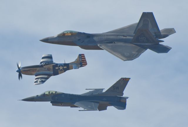 Lockheed F-16 Fighting Falcon (91-0376) - F-16, P-51, and F-22 during a heritage flight at Alliance Airport, 2010.