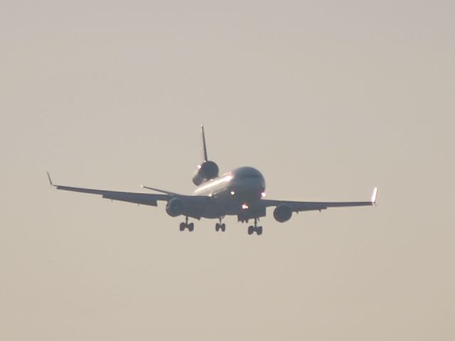 Boeing MD-11 (N277WA) - World Airways on final for runway 26R - 8/23/09