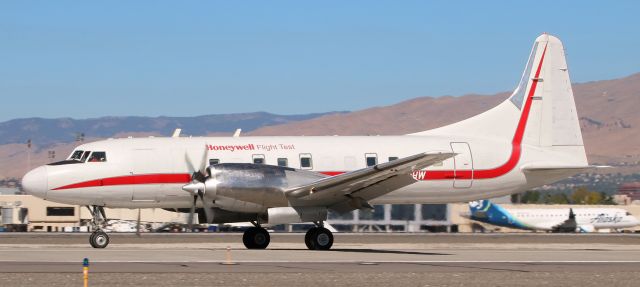 CONVAIR CV-580 (N580HW) - Could not help having a flashback to a wonderful era of aviation as I snapped this 1952 Convair 340 / 580 (N580HW) as it went past me on its deceleration roll after landing on RNOs 16L yesterday morning. The Honeywell International aircraft was returning to Phoenix from Seattle (KBFI) and stopped here to refuel.