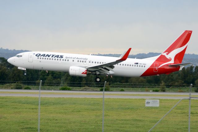 Boeing 737-800 (VH-VXC) - About to put down on runway 05. Thursday, 19 June 2014.