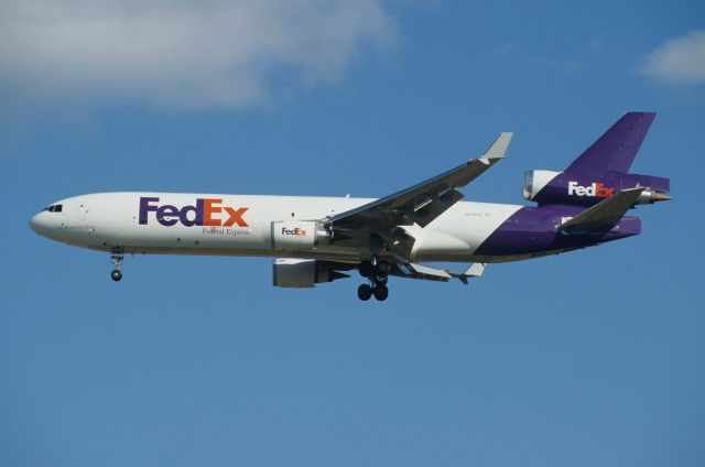 Boeing MD-11 (N619FE) - Final Approach to Narita Intl Airport Rwy34L on 1997/01/12