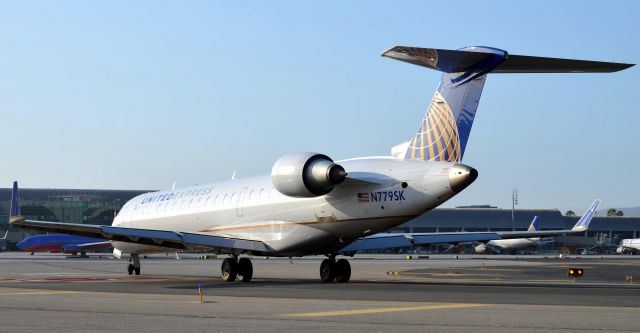 Canadair Regional Jet CRJ-700 (N779SK) - This is the correct version of the photo that I accidentally uploaded earlier. The RJ is taxing onto runway 20R for a morning departure to KSFO.