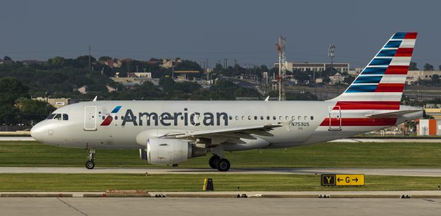 Airbus A319 (N753US) - Taxiing to depart 13Rbr /5/27/17