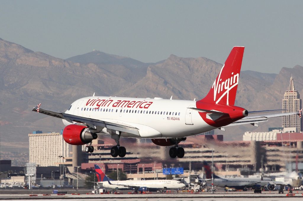 N524VA — - Alaskan Airlines 319 in it's former livery about to land at KLAS with Mt Charleston in the far background.br /Dec 2015