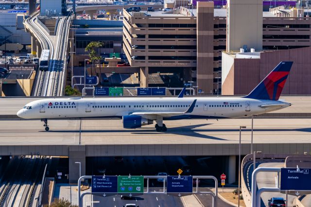 BOEING 757-300 (N587NW) - Delta Airlines 757-300 taxiing at PHX on 11/19/22. Taken with a Canon 850D and Tamron 70-200 G2 lens.