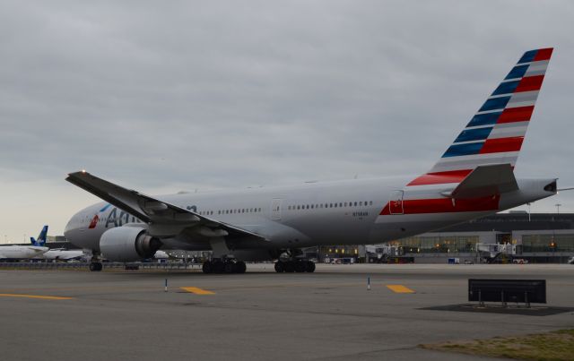 Boeing 777 (N798AN) - AA 772ER taxiing at JFK on a cloudy day