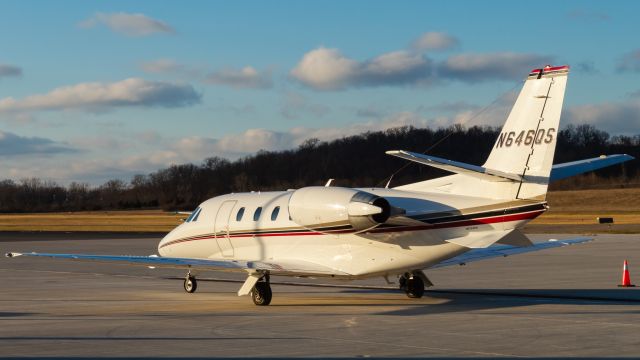 Cessna Citation Excel/XLS (N646QS) - A NetJets Citation sits at the FBO at Butler Co. Regional.