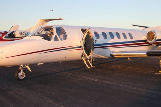 Cessna Citation V (N224GP) - At Arlington Municipal.Visiting with an old friend who is the pilot. It has a new red, white & blue paint job. He flew his bosses in for a Cowboys game.