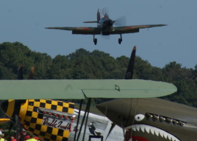 SUPERMARINE Spitfire (N730MJ) - Supermarine Spitfire MK-1XE on final. An amazing Warbirds over the Beach 2021 airshow at Jerry Yagen’s Military Aviation Museum at Pungo, VA near Virginia Beach, 2-3 October 2021. If you’ve never attended one of his airshows, you ought to check it out. Multiple formations of US Army Air Corps, US Navy, RAF, and German aircraft. With Covid, this show was a combined WWI, WWII, etc. airshow. 