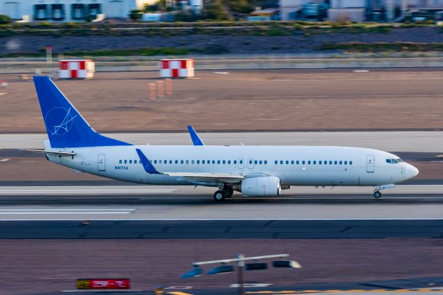 Boeing 737-800 (N917XA) - An iAero Airways 737-800 taking off from PHX on 2/19/23. Taken with a Canon T7 and Tamron 70-200 G2 lens.