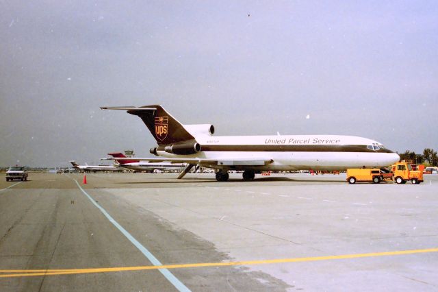 Boeing 727-100 (N907UP) - KSJC mid 1990s - I had a person I knew who worked for the City of San Jose Engineering Dept take these photos on the ramp with my 35mm camera and film, while he was out working Runway and Taxiway surveying. This 727-27 was eventually modified to 727-27C(QF) in later years. 