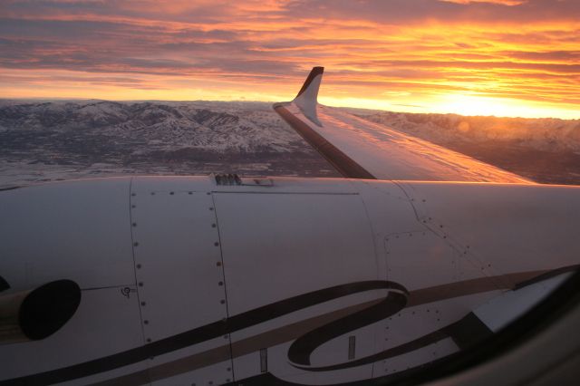 Beechcraft Super King Air 350 (N38H) - King air 350 over SLC at sunrise