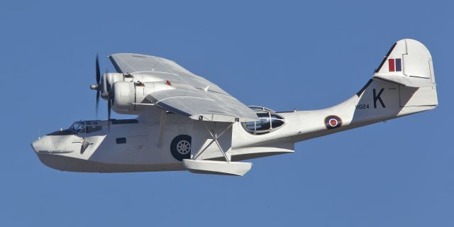 — — - Consolidated PBY-5A Canso over Paine Field, Everett, Wa.