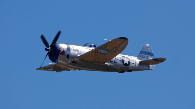 REPUBLIC Thunderbolt (N7159Z) - FHCs Republic P-47D (Ser #45-49406) makes a low pass over Rwy 34L during flyday 8.26.17.