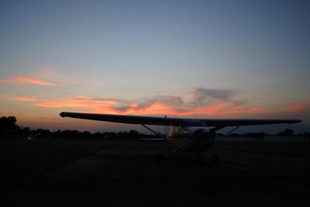 Cessna Skyhawk (N19840) - A dramatic shot just after sunset, the clouds full of color dancing on the 172 at Tri-Star Aviation.