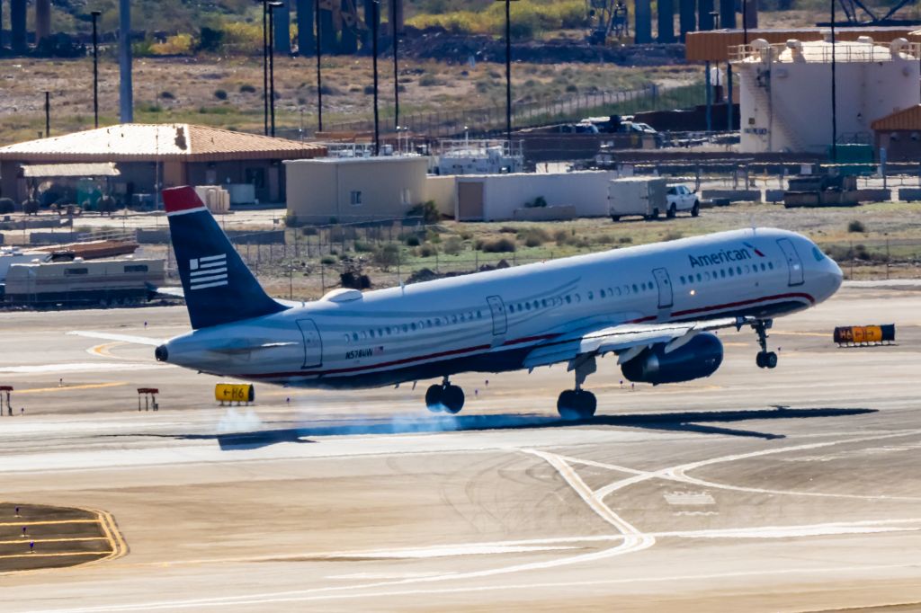 Airbus A321 (N578UW) - An American Airlines A321 in US Airways retro livery landing at PHX on 2/4/23. Taken with a Canon R7 and Tamron 70-200 G2 lens.