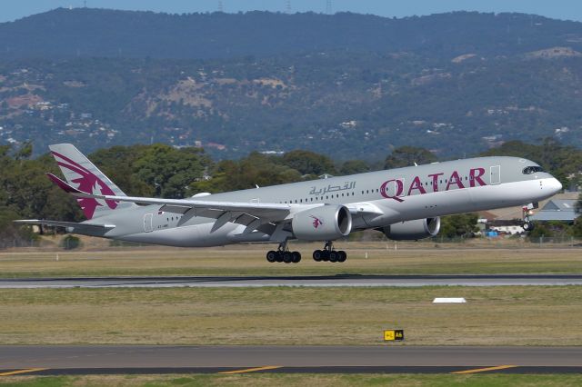 Airbus A350-900 (A7-AMK) - Feb 5 2020. Taken from inside the terminal, landing on runway 23. There's a story to this and photos to follow - see comments.