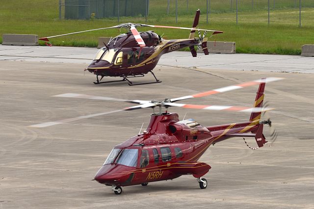 Bell 430 (N5RH) - Hendricks Motor Sports Choppers on Race weekend 05-25-25. N35RH in background.