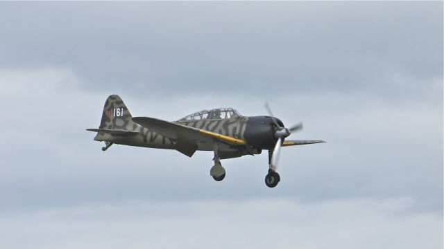 Mitsubishi A6M Zero (N3852) - Flying Heritage Collections Mitsubishi A6M3 ZERO on final approach to runway 16R for a touch/go landing on 6/6/12.