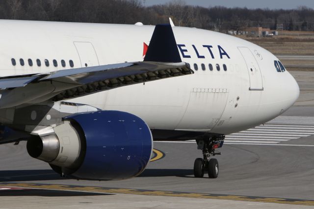 Airbus A330-300 (N803NW) - March 27, 2011 - leaving Detroit 