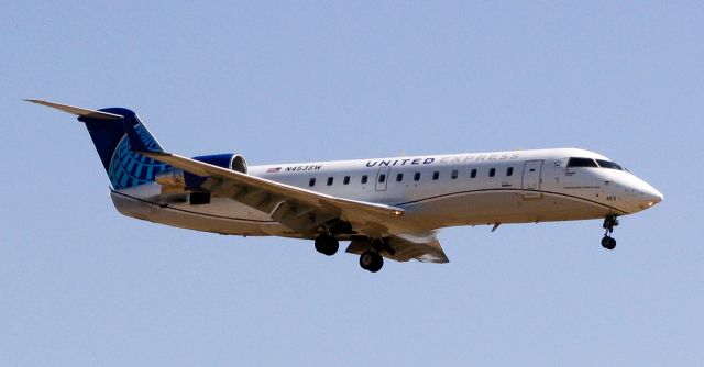 Canadair Regional Jet CRJ-200 (N453SW) - United Express on short final for runway 11R at Fresno Yosemite Int.