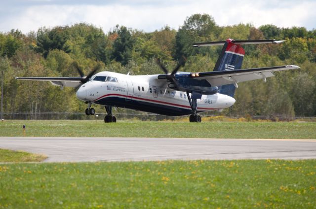 de Havilland Dash 8-200 (N804EX) - Landing RW32.