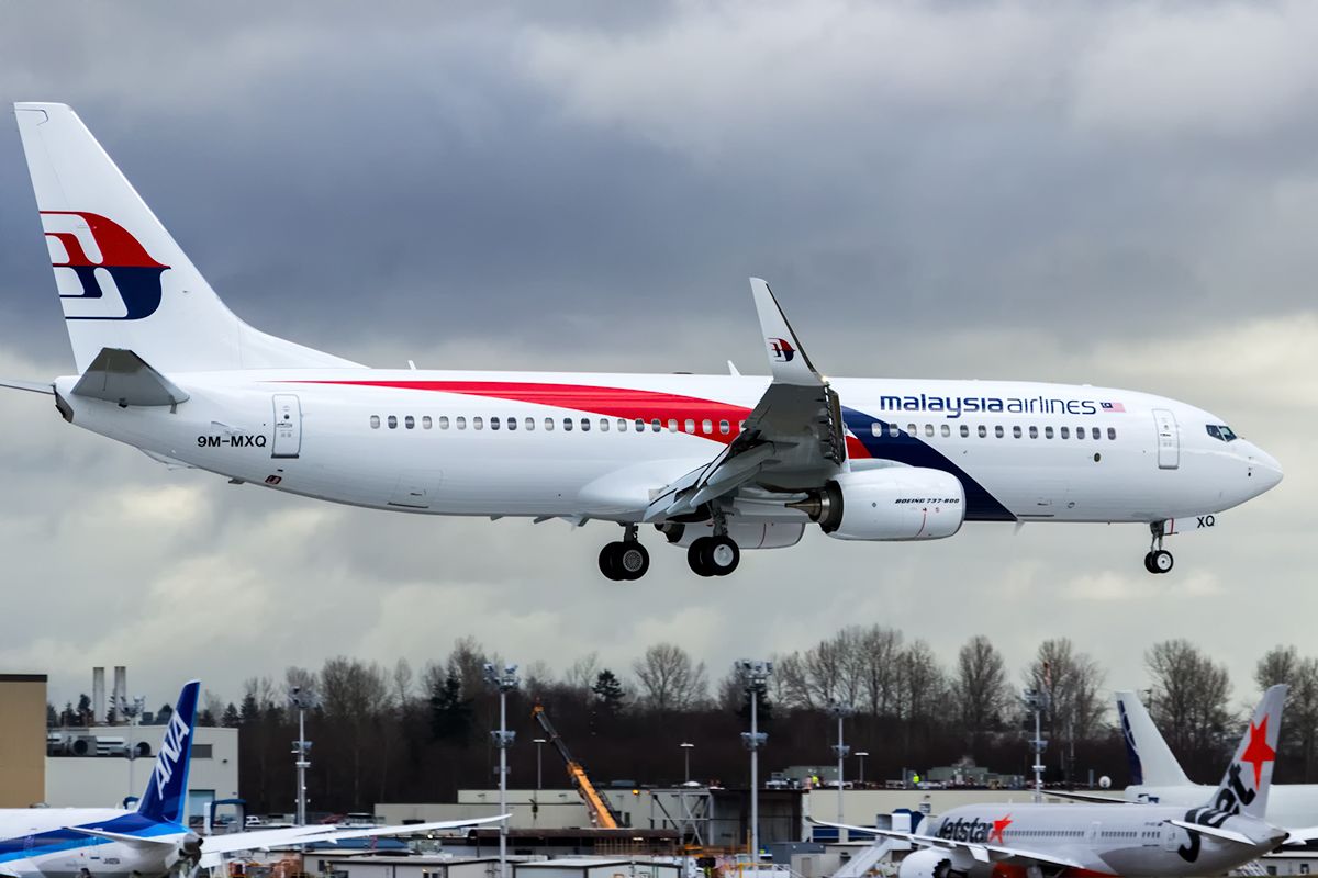 Boeing 737-700 (9M-MXQ) - Malaysia Airlines B737-8H6(WL) 9M-MXQ swinging by Paine Field for some low passes and a touch 'n go during its maiden flight on friday.