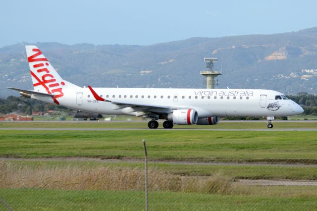 Embraer ERJ-190 (VH-ZPE) - On taxiway heading for take-off on runway 05. Thursday, 19 June 2014.