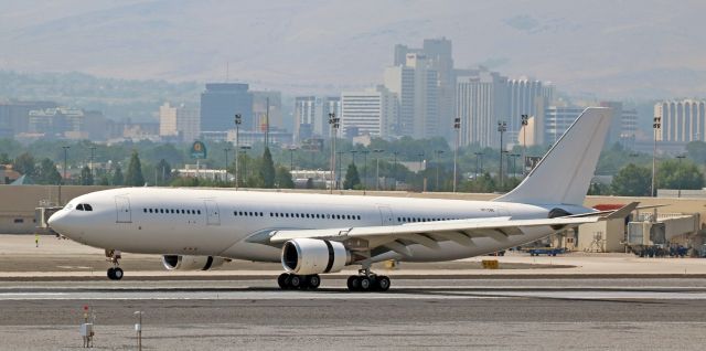 Airbus A330-200 (VP-CBE) - Forced to make an instrument approach to the airport due to the thick, heavy smoke covering the Truckee Meadows coming from three terrible wildfires (the Carr Fire at Redding, CA; the Whaleback Fire at Susanville, CA; and the Perry Fire at Pyramid Lake, NV, just north of Reno), HKJs all-white VP-CBE (an A330-2xx) touches down on Reno-Tahoe Internationals 16R at 2:45 in the afternoon. The air temperature was 104 degrees as this unmarked Hongkong Jet (HKJ) Airbus was arriving from Hawaii.br /The huge jet carried less than two dozen passengers. Must be nice to have enough $$ to charter a jet like this for 20 or so folks. It will be in Reno for 10 or 11 days.