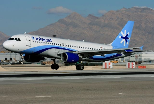 Airbus A320 (XA-VCT) - About to touchdown on RWY25L in Las Vegas (KLAS/LAS)on flight from Mexico. 