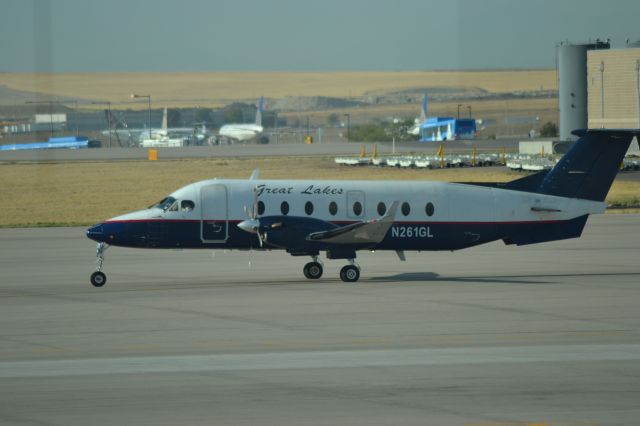 Socata TB-20 Trinidad (N261GL) - Great Lakes Airlines taxiing to gate in DEN