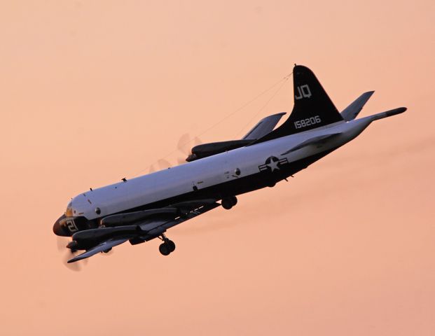 15-8206 — - 158206 CoNA Bird turning short final for NUW.  Shot near Dugualla Bay Farms, Oak Harbor, WA.