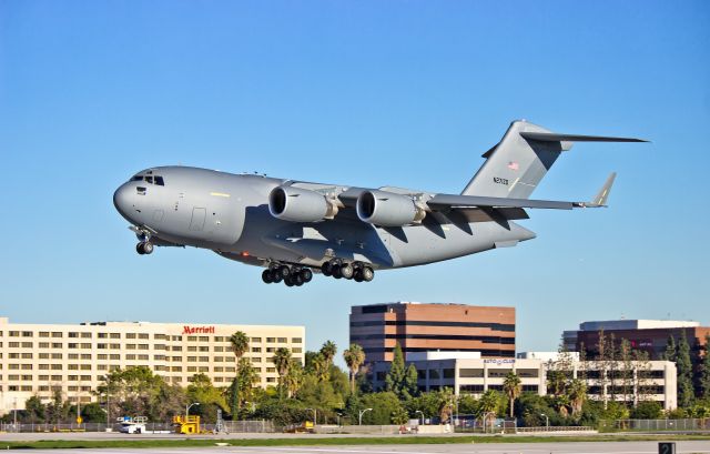 Boeing Globemaster III (N271ZD) - A "white tail" Boeing C-17 Globemaster III landing after its maiden test flight from the Boeing Factory in Long Beach, CA at KLGB